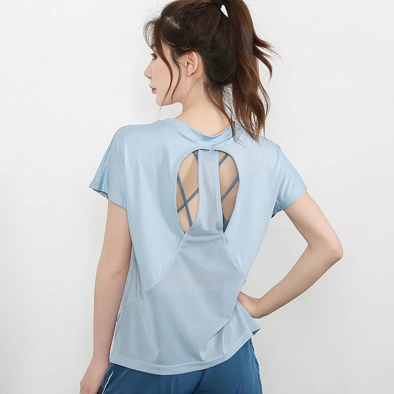 Women's short sleeve polyester sports T-shirt in grey green, shown for running and fitness activities.