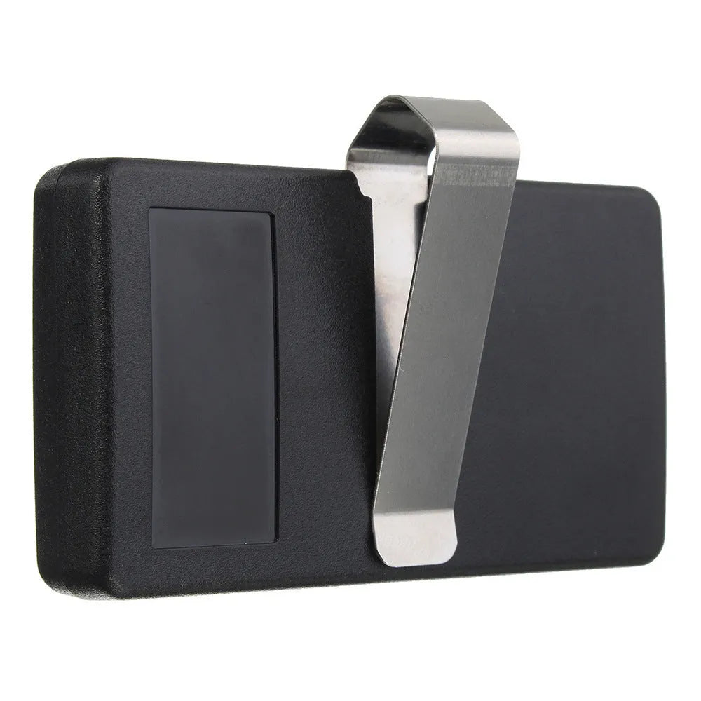 Black three-button garage door remote control with 390 MHz frequency.