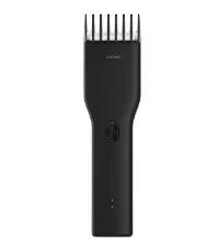 Black cordless electric hair clipper with nano ceramic cutter head and adjustable slider comb for men's grooming