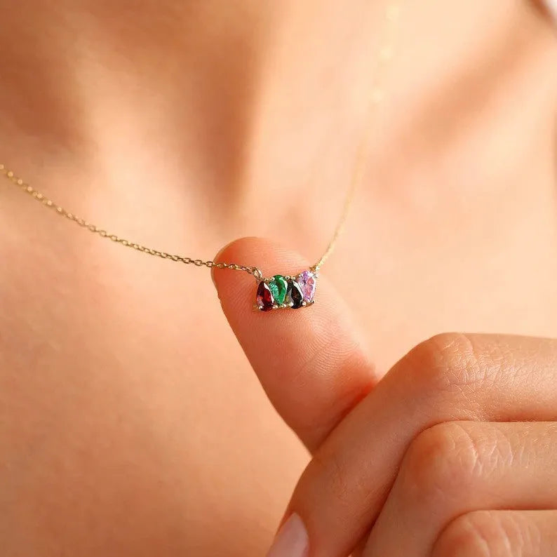 Titanium steel birthstone necklace with a single zircon pendant on a princess-length chain.
