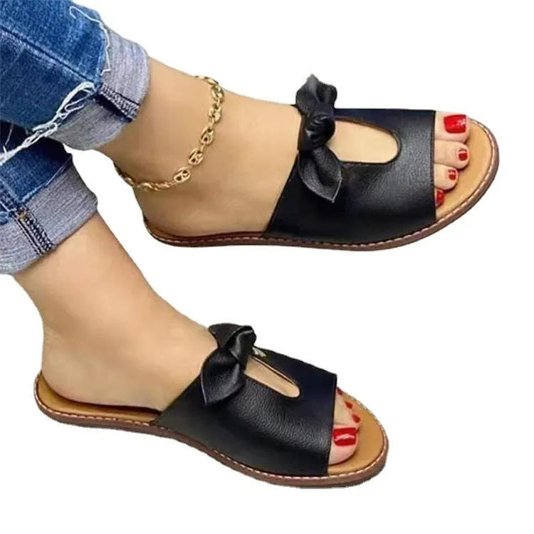 Women's casual sandals with bow detail on fish mouth open-toe design in black, pink and gold colours