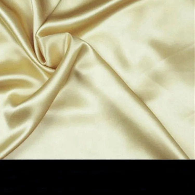 19 M double-sided silk pillowcase shown in apricot colour, lying flat to show envelope closure.