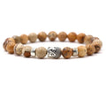 Natural stone stretch bracelet with Tigereye Buddha head charm and 8mm beads.