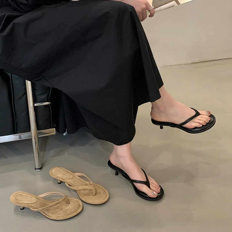 Women's round toe stiletto flip-flop sandals in black and camel colours showing open-toed design