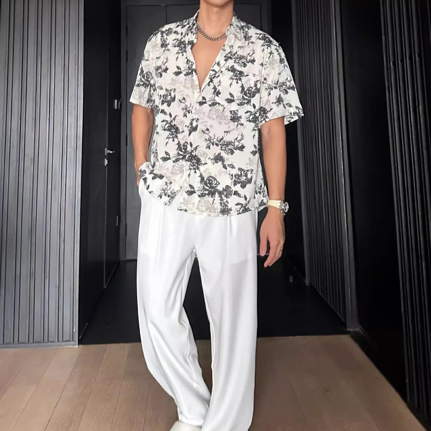 White floral printed casual shirt with short sleeves and loose cardigan-style fit