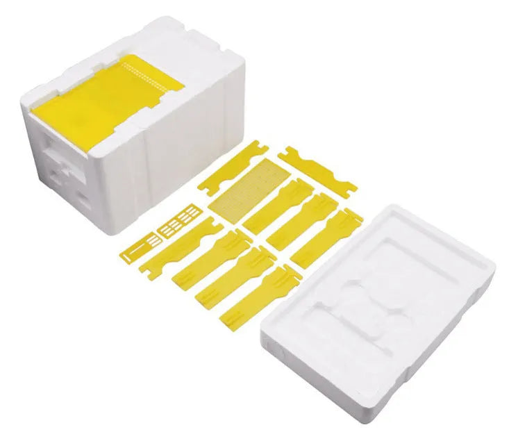 Three white EPS foam bee breeding boxes for hive mating and pollination procedures