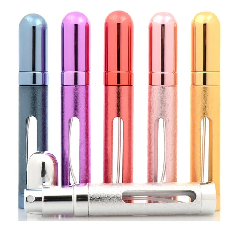 12ml aluminium portable perfume bottle in bullet shape with glass liner, shown in various colours.