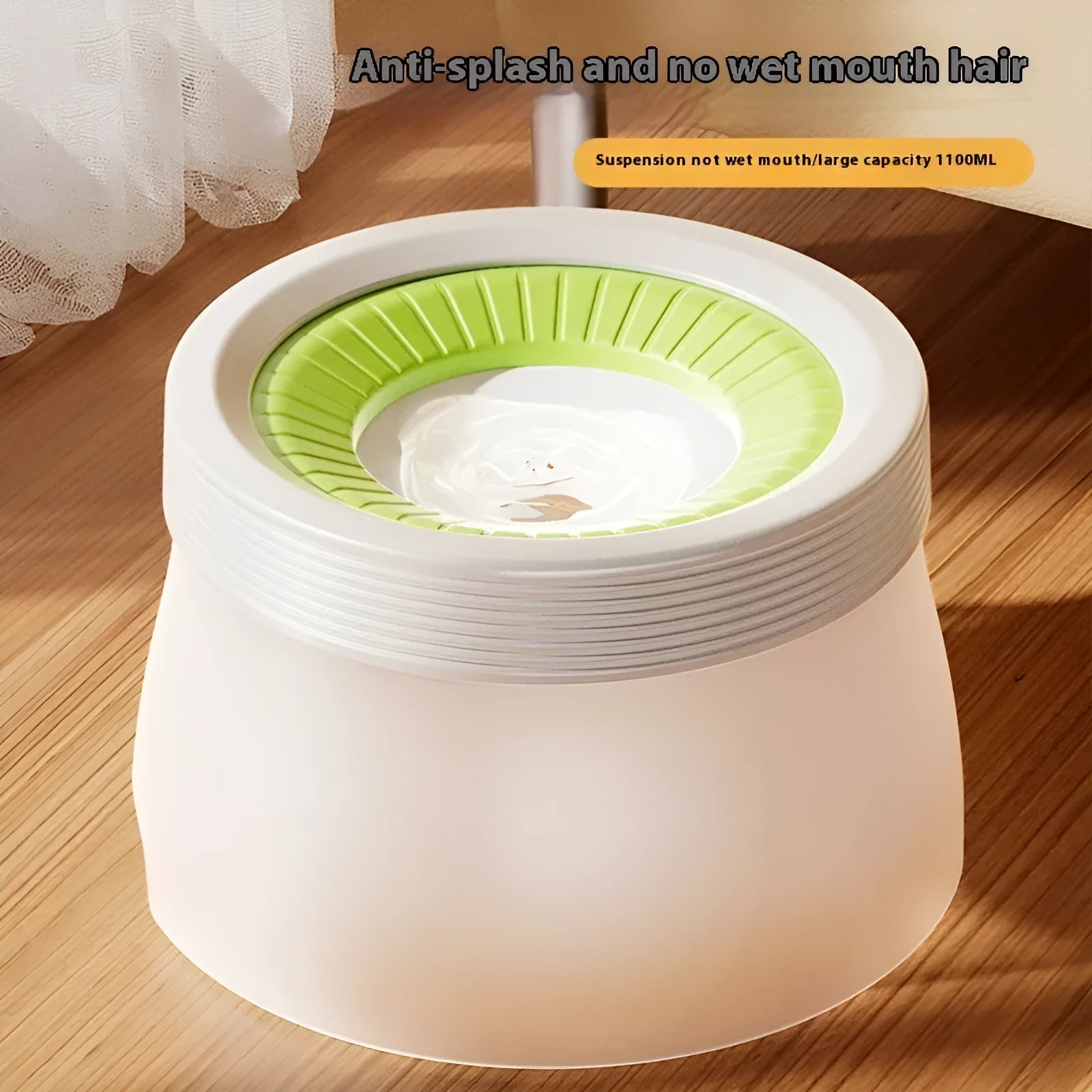 Green pet suspension bowl with non-wet mouth design for cats and dogs on white plate