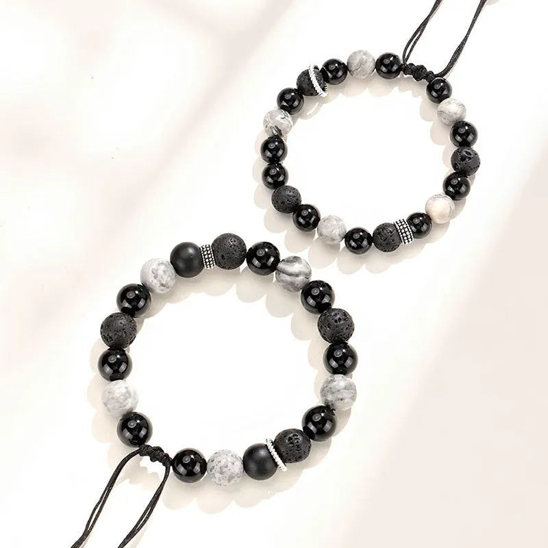 Black agate map stone and volcanic rock bracelet with diamond shaped beads in 8mm and 10mm sizes.