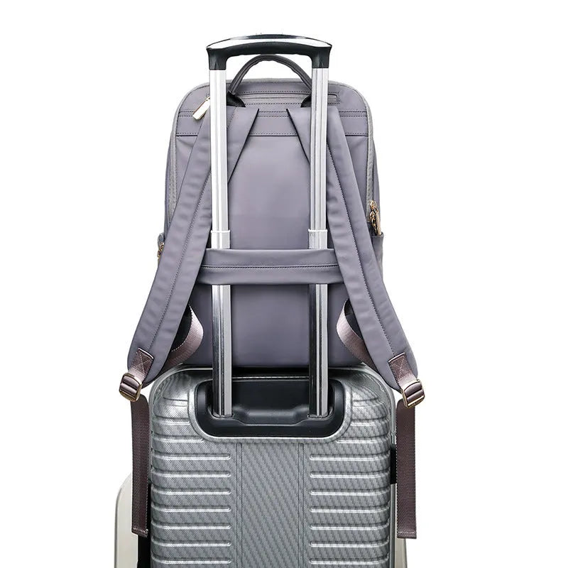 Oxford cloth women's backpack in black or purplish grey with large capacity and anti-theft zipper