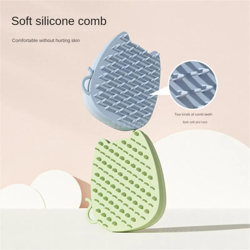 Blue silicone pet comb with dual-texture bristles for grooming cats and dogs on a white background.