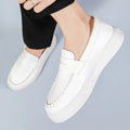 Men's casual leather slip-on shoes with round toe in black and white, khaki, or white options