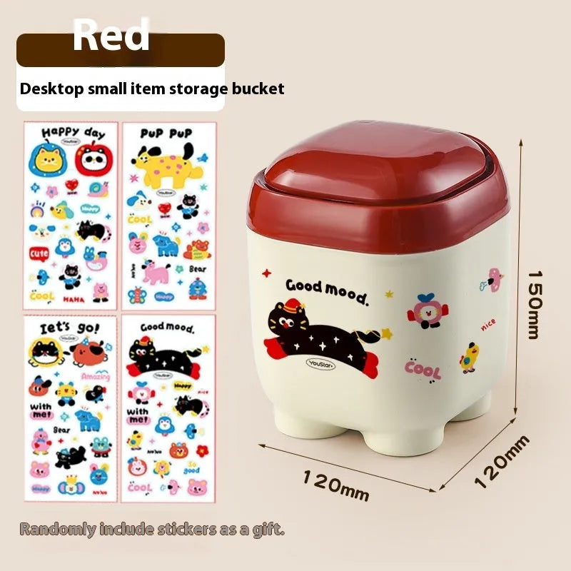 Cartoon-style plastic desktop organiser with grid compartments and labelling stickers for stationery storage