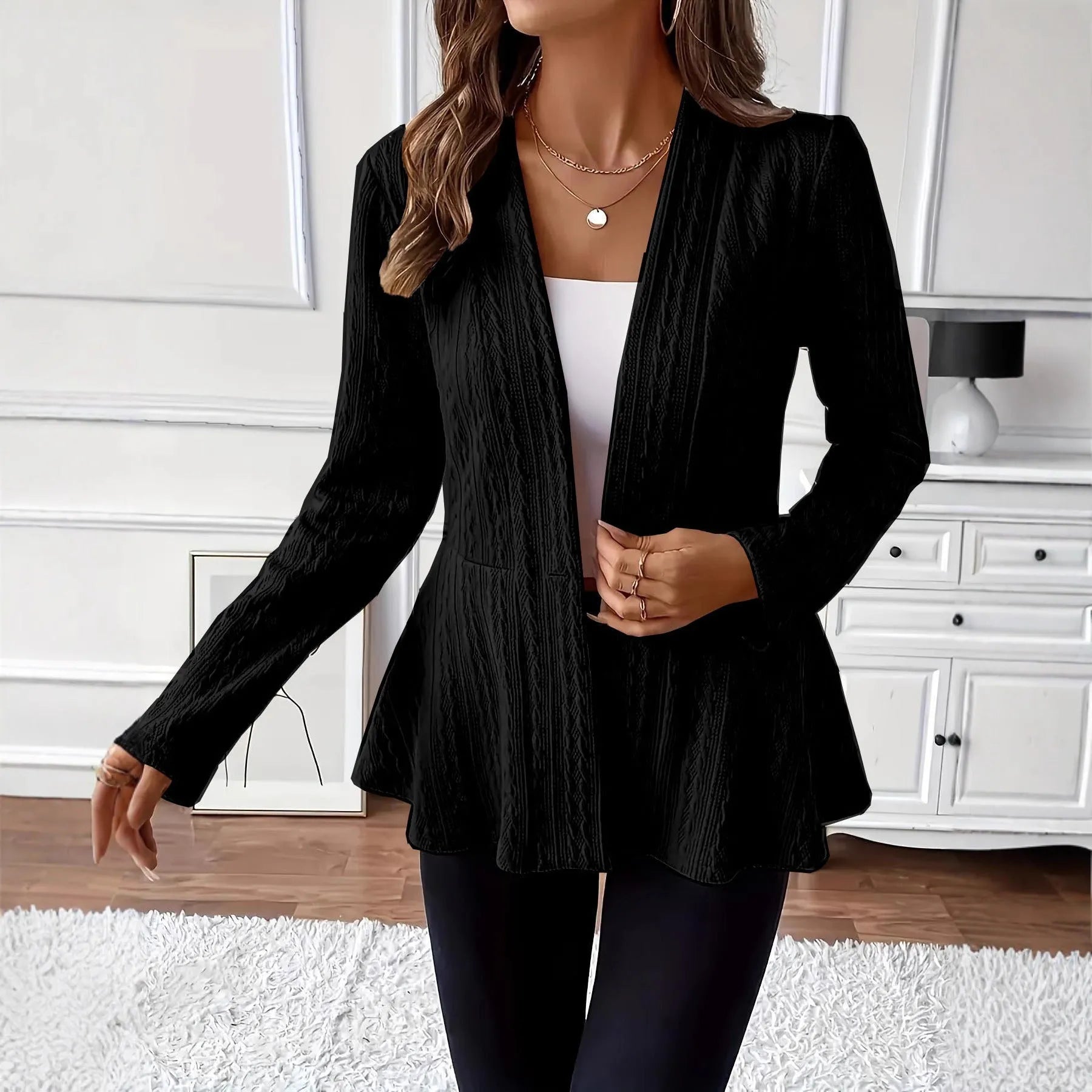 Women's apricot coloured knitted cardigan with single button front and jacquard pattern detail
