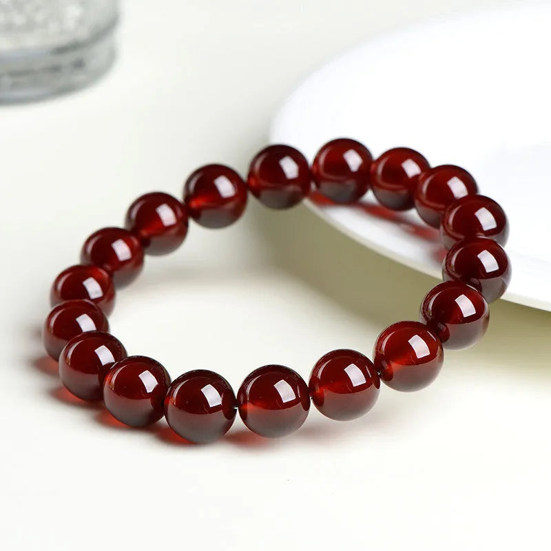 Natural orange red garnet ball bracelet with Ruyi style beads in 5A and 7A grades
