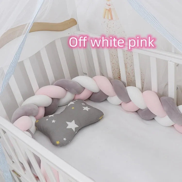 Braided knot design baby crib bumper in spandex velvet, shown in a light grey colour.