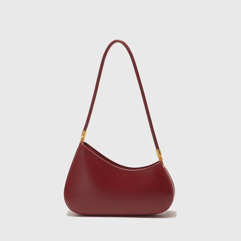 Women's oval underarm handbag in PU material with single strap and zippered compartment