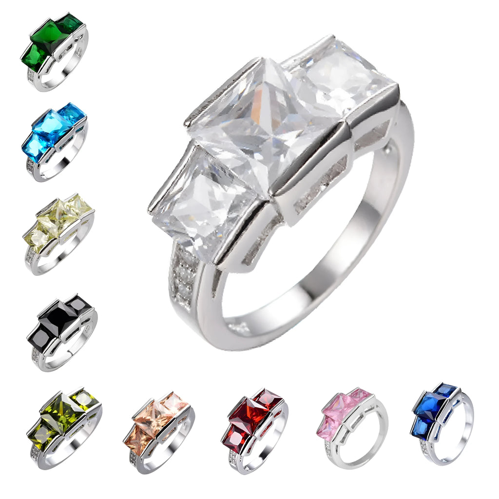 A set of colourful electroplated copper rings for women in sizes 6 to 10, showing apple green, champagne, and sapphire blue colours.
