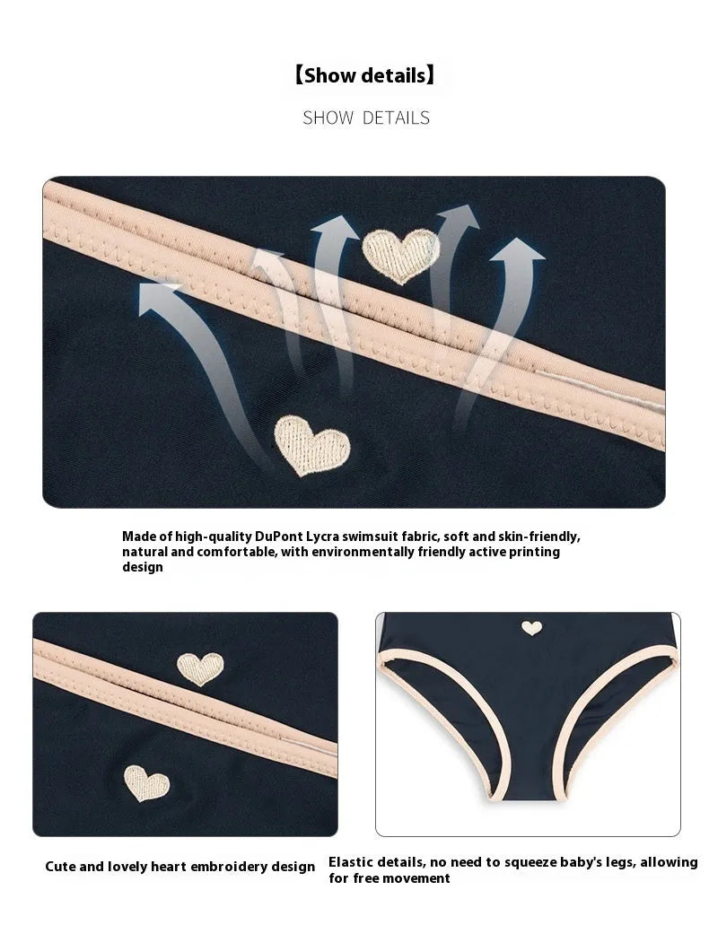 Dark blue split-style briefs swimsuit for baby girls, shown in sizes from 90cm to 130cm.