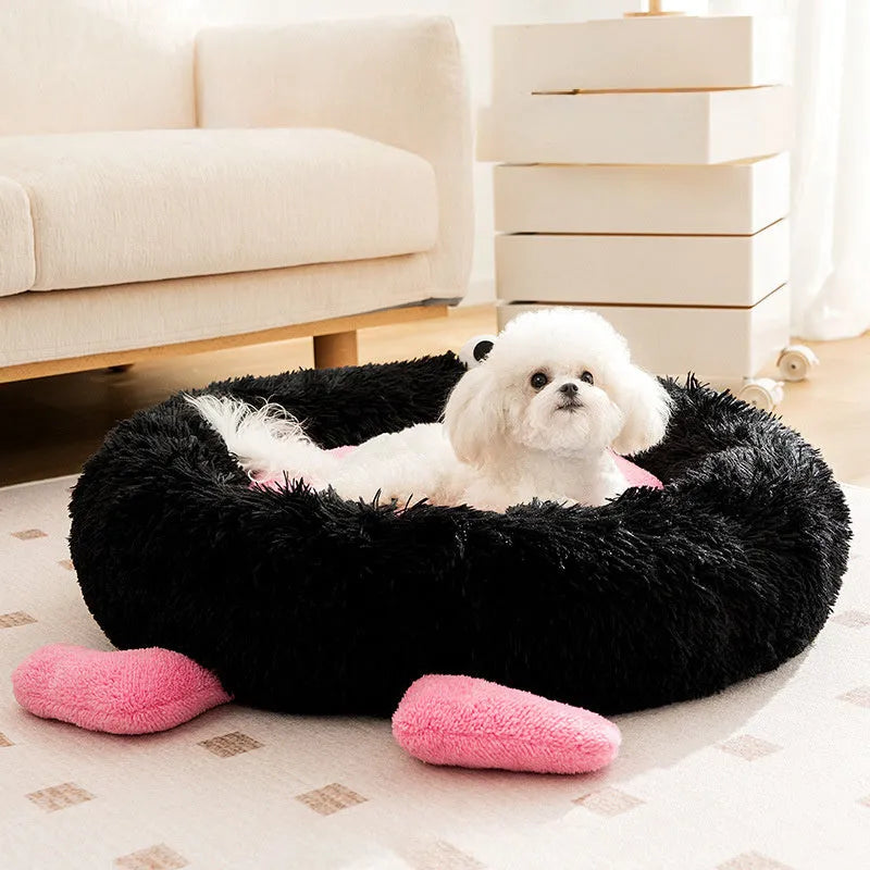 Elf Briquettes blue plush pet bed mat inside a dog crate
