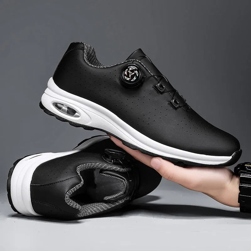 Low top mesh tennis shoes with cross straps and composite sole in black and white