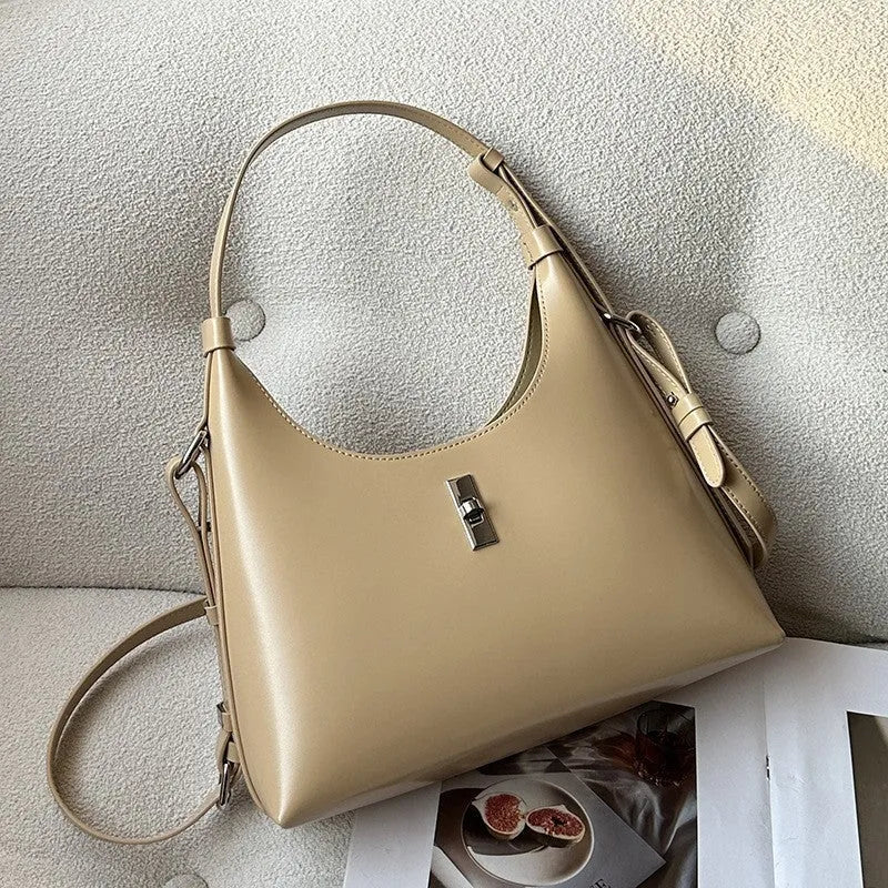 Genuine leather crossbody shoulder bag with dumpling shape and sandwich pocket design