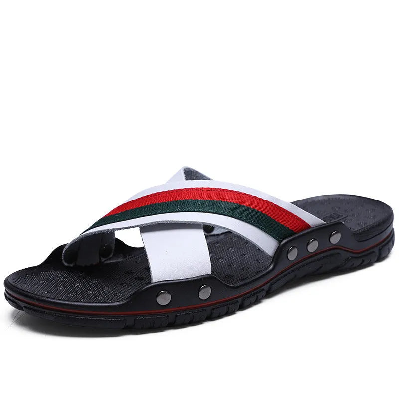 Men's black cowhide leather beach sandals with a non-slip PU sole on a sandy background.
