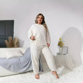 Women's creamy white two-piece trousers set with plush crew neck top and matching trousers in Japanese Korean casual style