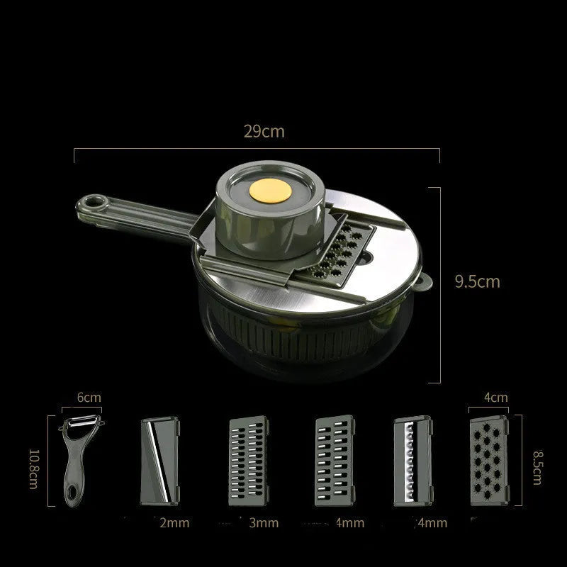 Multifunctional vegetable slicer in grey or green with five stainless steel blades, hand guard and paring knife