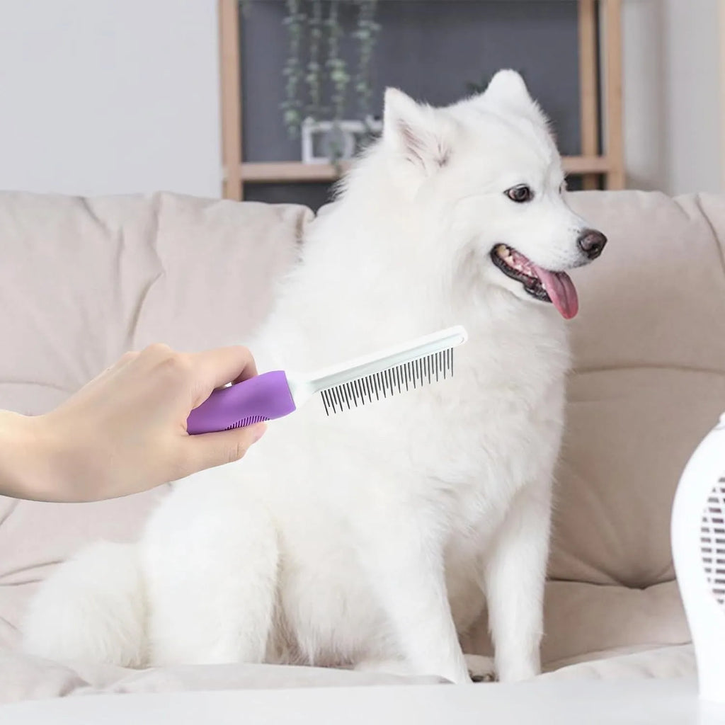 Purple pet detangling comb with stainless steel long and short teeth on a white background