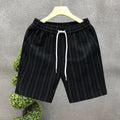 Men's black and white striped fleece-lined casual shorts with an ankle band and double waistband.
