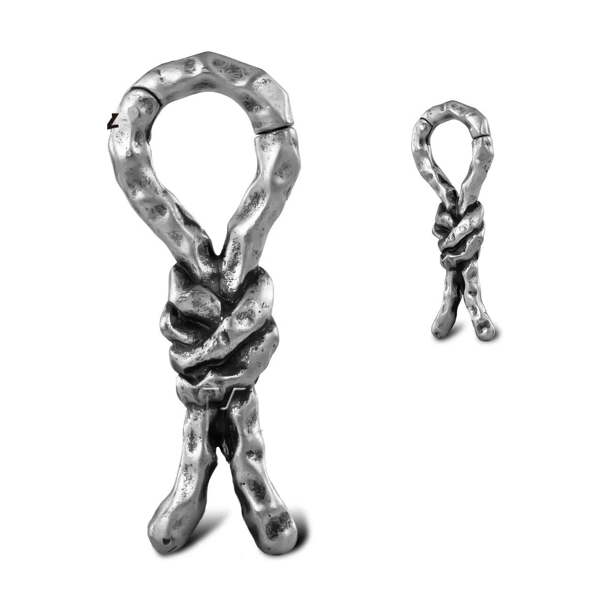 Copper bends and hitches piercing earring for auricle, showing sculptural shape and oiled finish.