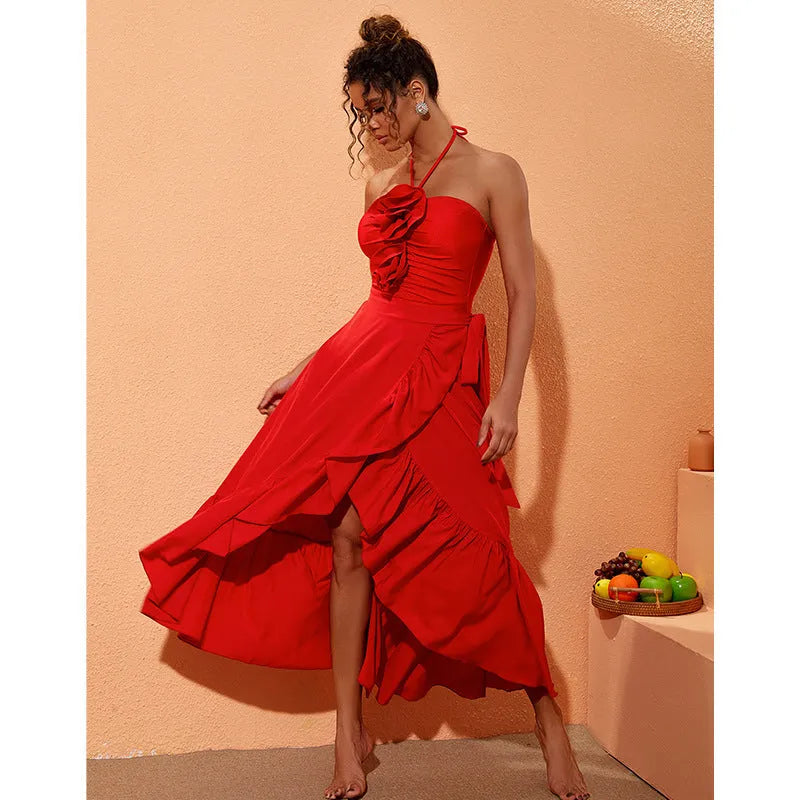 Red V-neck one-piece swimsuit with open back and matching long skirt for women.