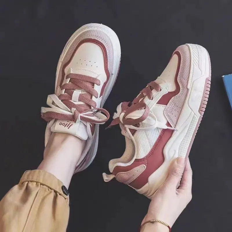Low top rubber sneaker in pink or milky white with height increasing sole and breathable design