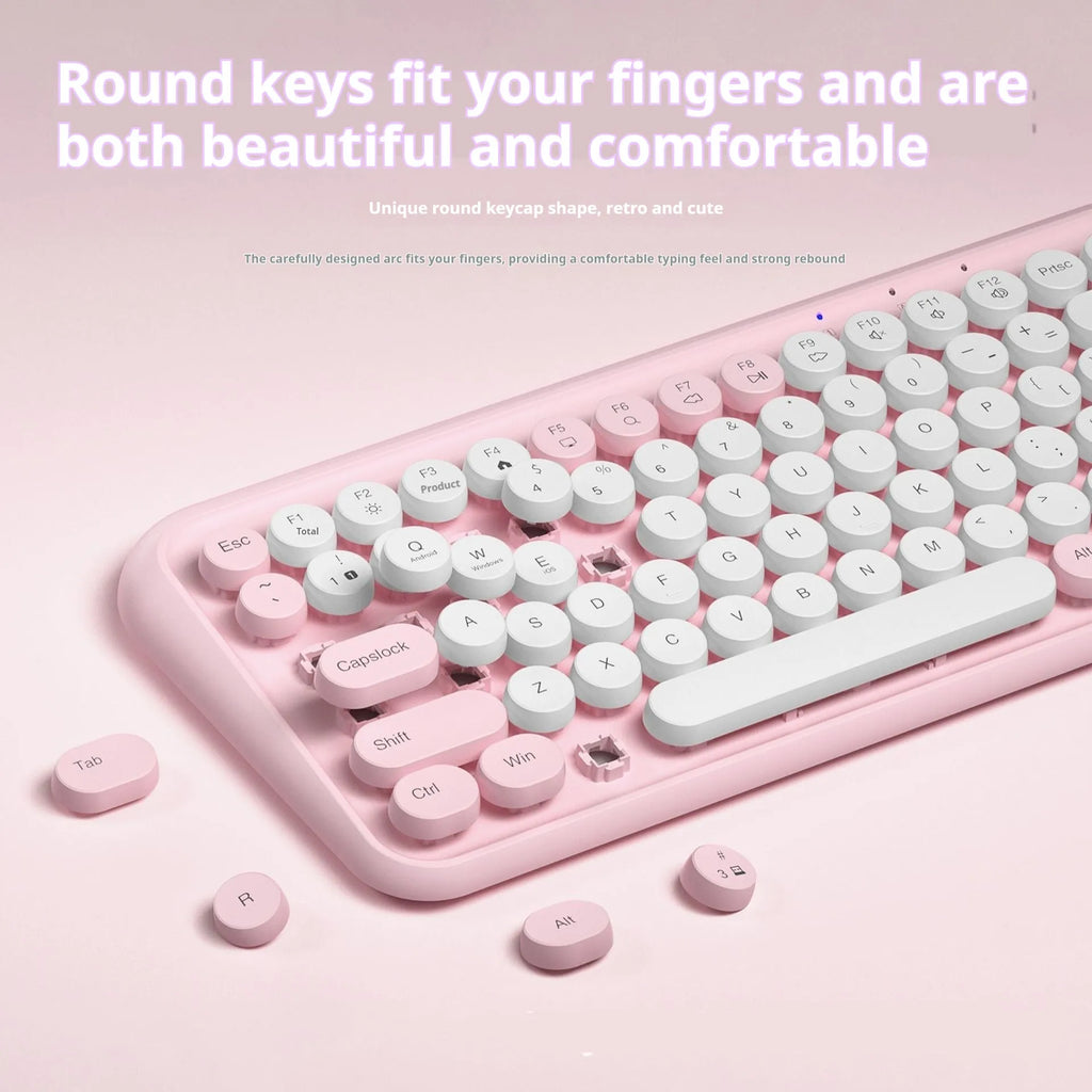 Pink dual-mode Bluetooth keyboard with mute function and 84-key compact layout