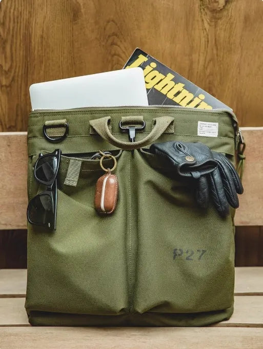 Canvas messenger bag with retro style, shoulder strap, and open showing 15-inch laptop compartment