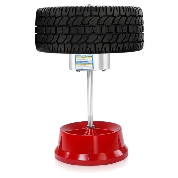 Portable aluminium hub balancer for car and truck tyres with 1.5 to 4 inch hub range on enamel-finished base.
