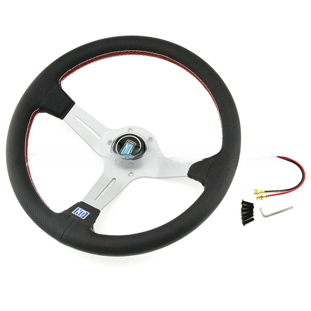 Leather 14-inch steering wheel with a concave centre, shown with black and silver skeleton frame options.