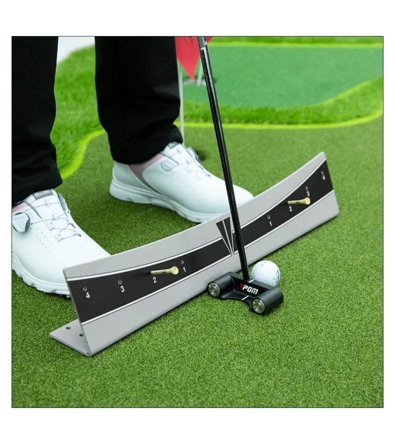 Golf putter trajectory balance simulator with adjustable push rod on a flat surface.