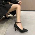 Black women's stiletto pump high heels with a skull-pattern buckle decoration on the front.