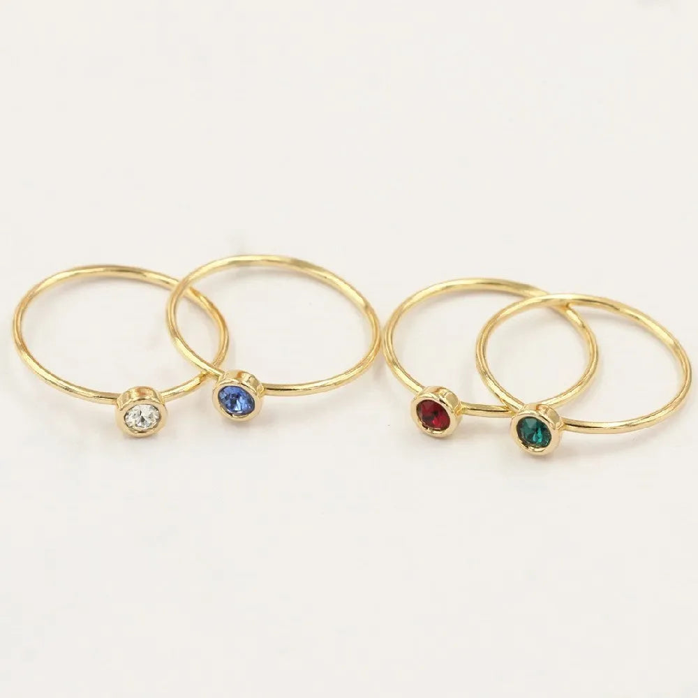 Women's copper knuckle ring with 14K gilded GF zircon DIY ornament accessories in green, blue, dark red, and white colour options.