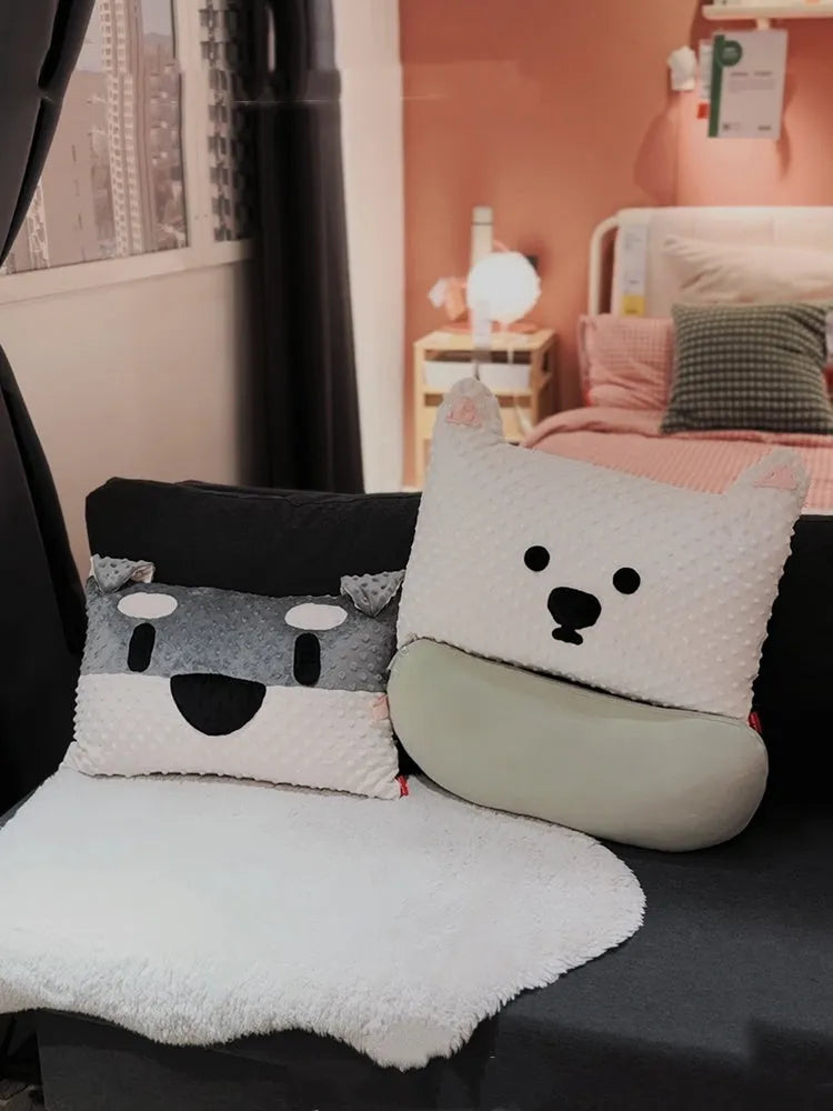 Grey schnauzer cartoon design pet pillow cushion on a sofa.