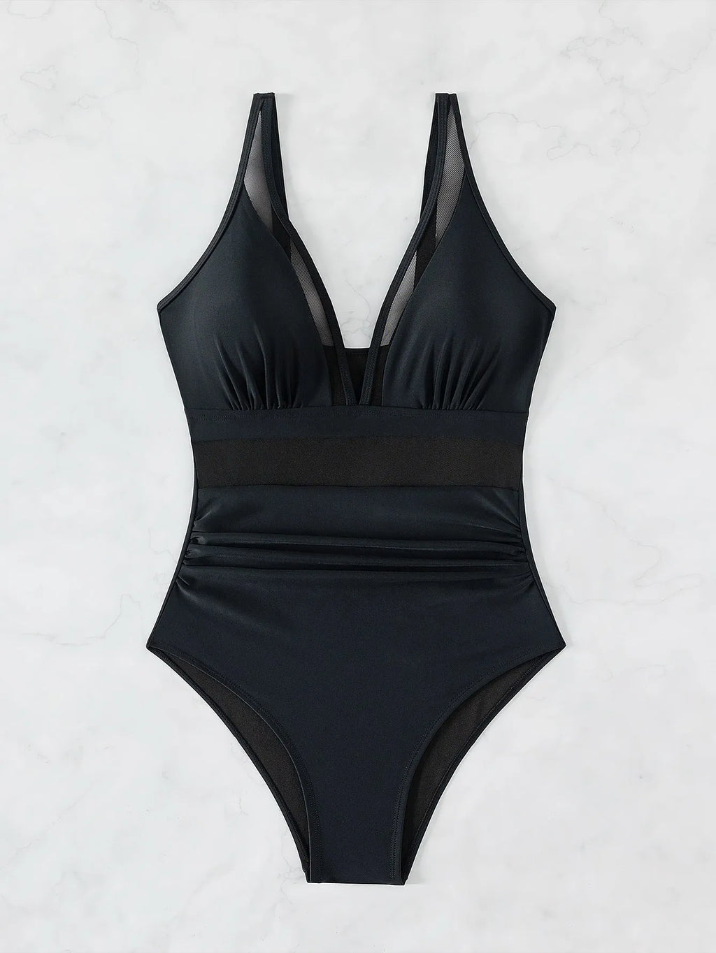 Black women's halter neck one-piece swimsuit with mesh panels and briefs style bottom.