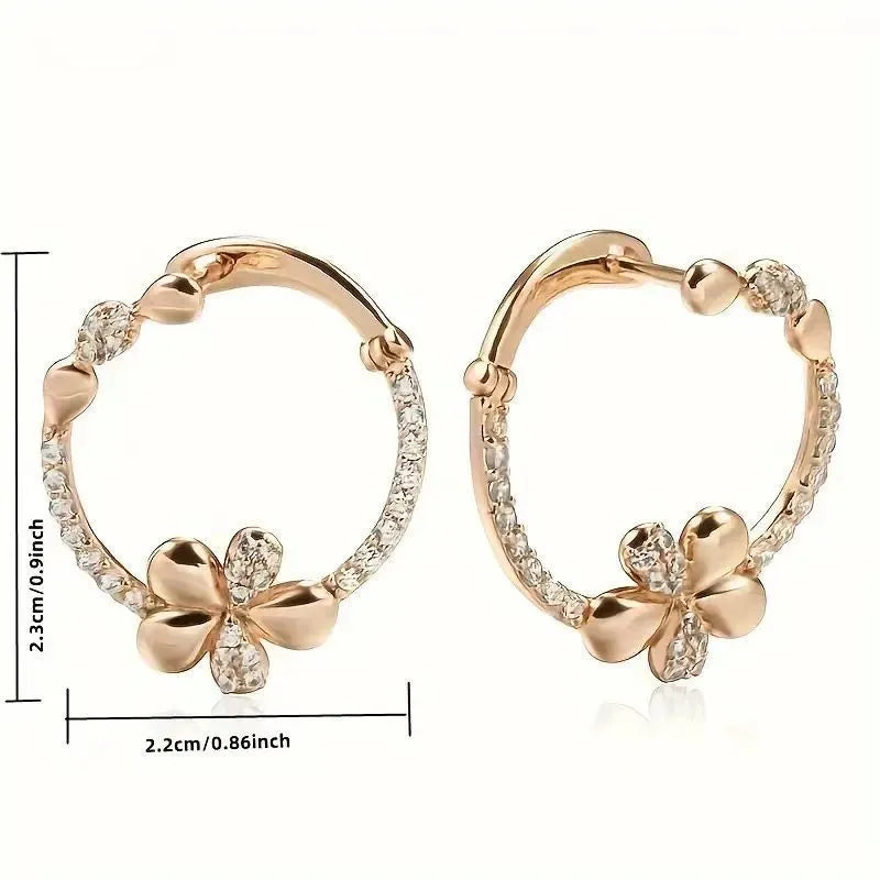 A pair of round copper hoop earrings for women with an electroplated finish.