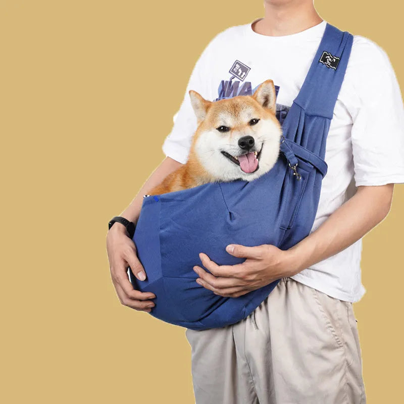 Folding cat carrier backpack with mesh panels shown in a selection of colours including black, blue and pink