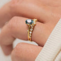 Gold plated women's ring with green zircon flower design on alloy band
