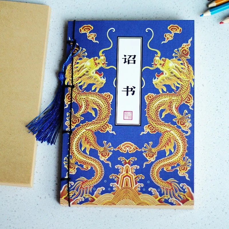 A5 antique wire-bound notebook with glossy embossed cover featuring a retro painting design, shown open.