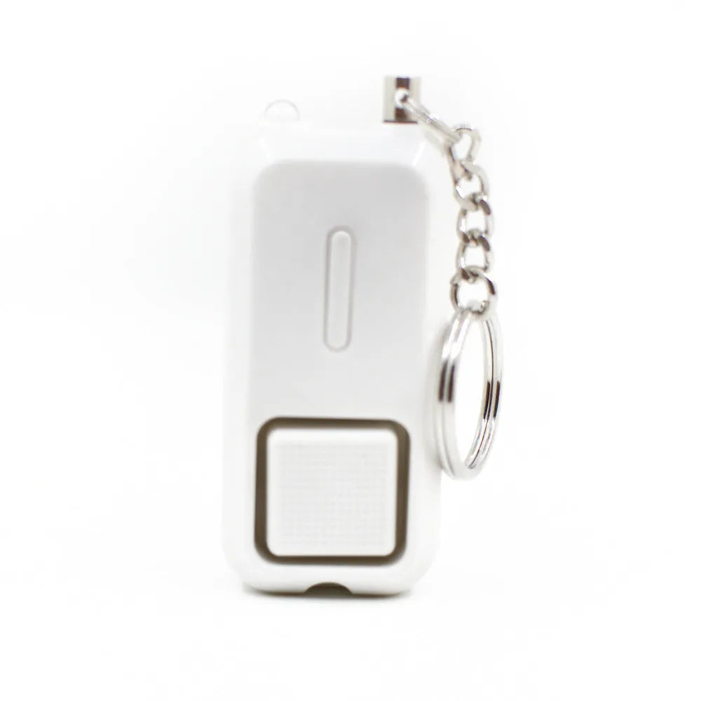 Compact pink personal safety alarm for women with keychain, shown next to its white box.