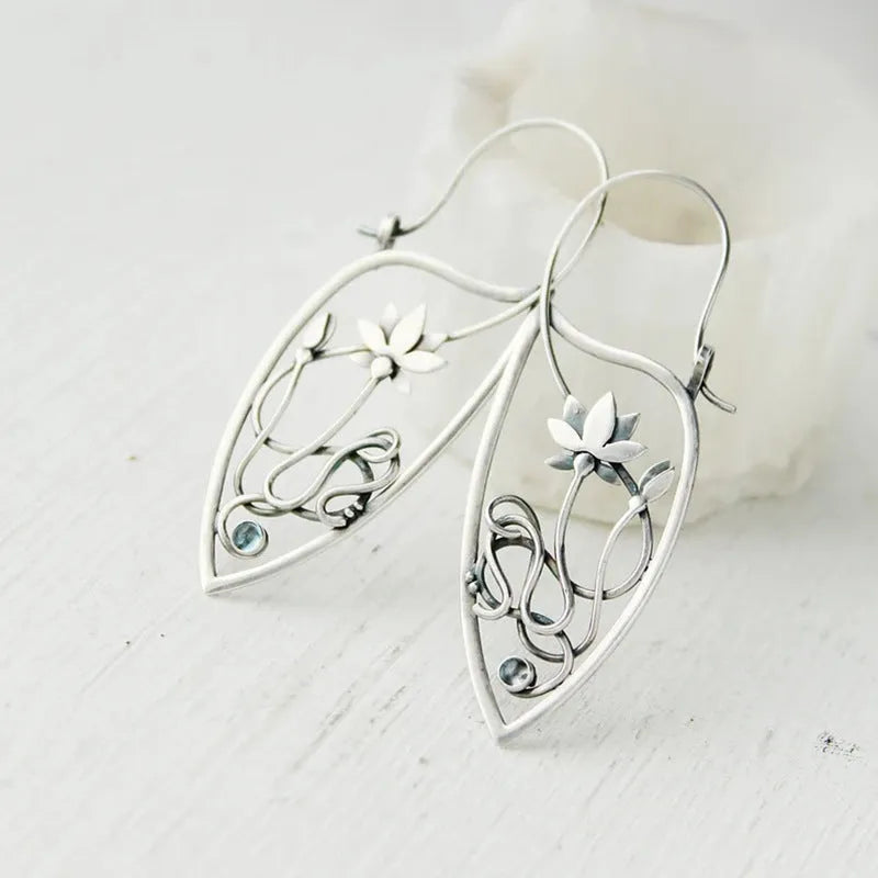 Silver-colour geometric lotus vine earrings with rhinestone centre
