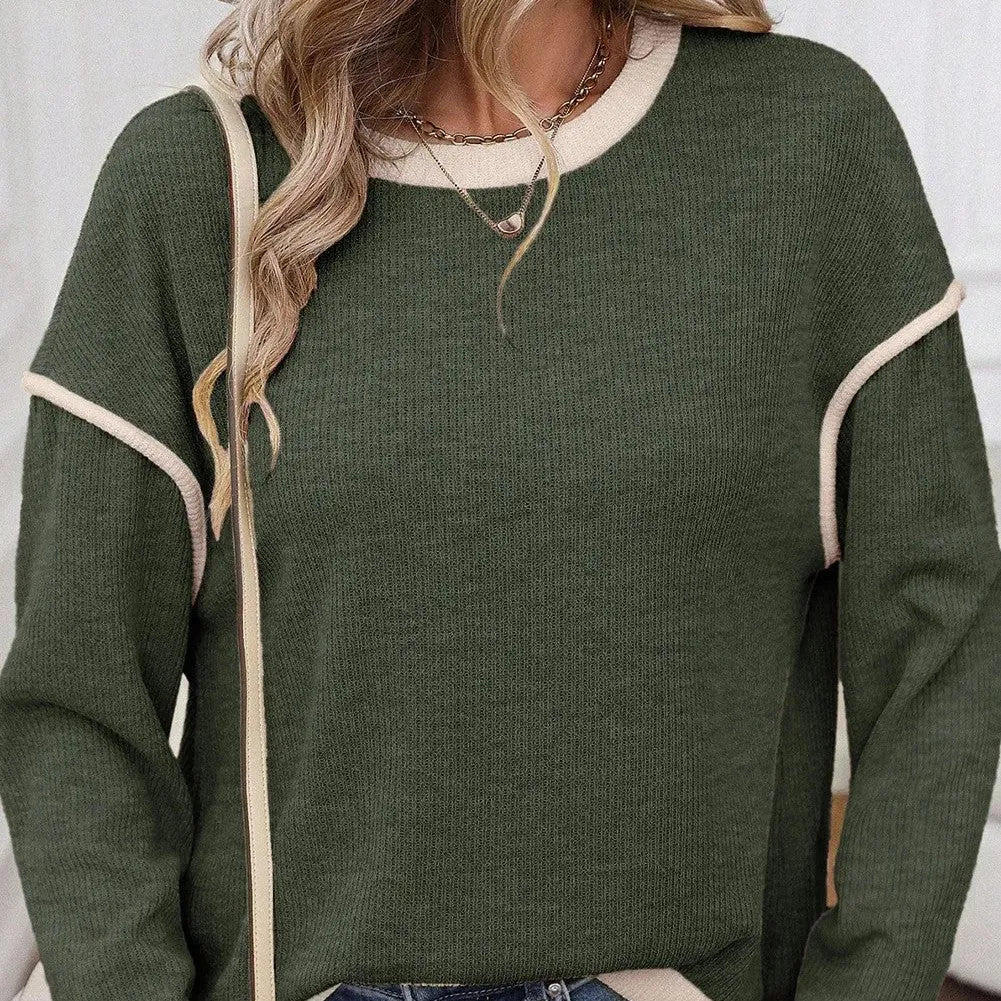 Drop shoulder loose knit top with four leaf clover contrast colour trim in polyester-elastane fabric